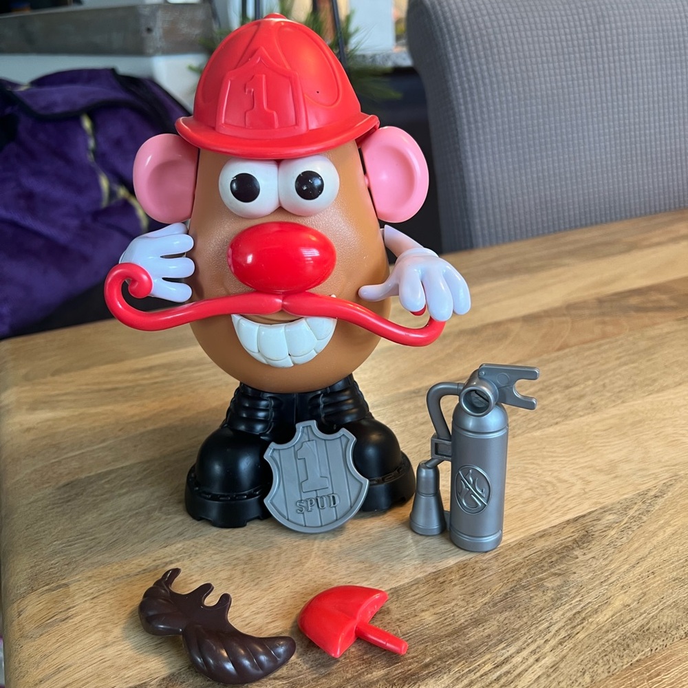 Firefighter Figure - Red, Black, Brown